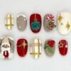 Teddy bear Santa press-on nails in red, taupe and cream with a 3D bear, a candy cane, gold plaid and holly berries
