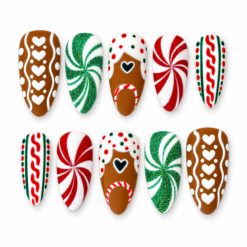 Gingerbread christmas press-on nails with icing hearts, peppermint swirls, candy-cane details and green glitter.