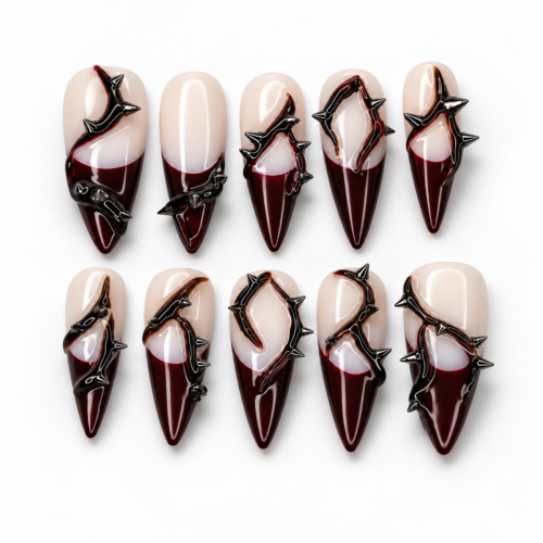 French-inspired tips, sweeping thorn-like lines and pointed black details