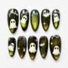 Green ghost press-on nails with black and green glitter, white ghosts, spiderwebs and spider accents