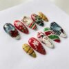 Santa's sleigh-themed press-on nails