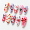 Press-on nails featuring safety pin and stitch designs