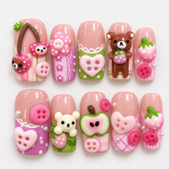 Kawaii strawberry press-on nails with pink gingham, strawberries, teddy bears, hearts and button-style accents