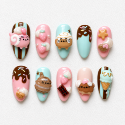 Kawaii dessert cat press-on nails in pink and aqua with strawberries, cookies, chocolate, ice cream and cat designs