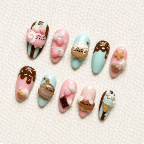 Press-on nails with cute candy and treat designs