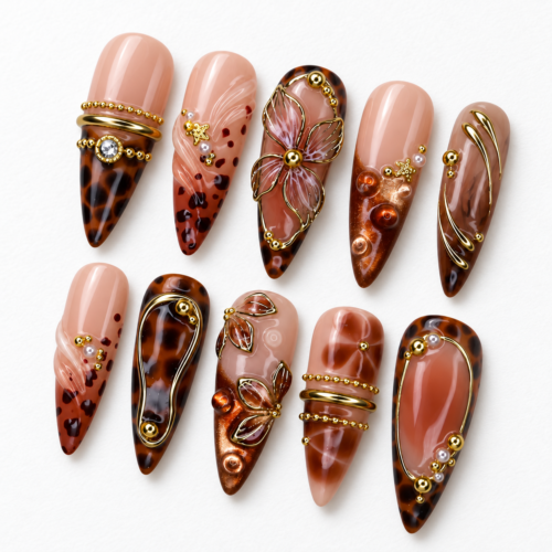 flowing gold-tone lines, leaf details, ornamental bands press on nails