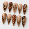 press on nails tortoiseshell-inspired pattern, gold filigree, chains