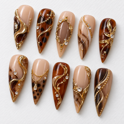 press on nails tortoiseshell-inspired pattern, gold filigree, chains