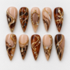 press on nails tortoiseshell-inspired pattern, gold filigree, chains