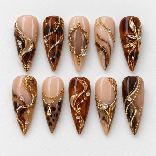 press on nails tortoiseshell-inspired pattern, gold filigree, chains
