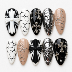 Gothic chrome press-on nails in black, white, nude and silver with cross motifs, sculpted bows, abstract lines and metallic swirls