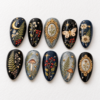 mushrooms, a butterfly, a crescent moon press on nails