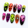 Black cat, jack-o’-lanterns, ghosts, bats press on nails