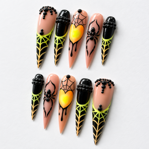 Spiders, spiderwebs, a glowing heart and black bead-like details