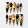 Spiders, spiderwebs, a glowing heart and black bead-like details