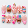 press-on nails with blush-pink bases, iridescent rainbow gradients
