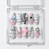 Pink cat charm press-on nails in blush, white and gray with silver chains, music notes, stars and a dotted cross