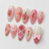 Roses, floral stems, lace-inspired patterns and bows press on nails