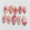 Roses, floral stems, lace-inspired patterns and bows press on nails