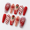 Snowflakes, glitter bows, candy-cane stripe press on nails
