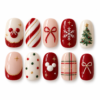 Red ivory christmas press-on nails with candy stripes, bows, snowflakes, a tree, plaid and mouse-head motifs.