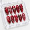 press-on nails with silver-toned details, gem-like accents