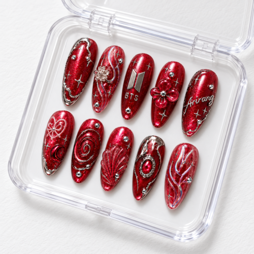 press-on nails with silver-toned details, gem-like accents