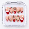 Reindeer Christmas press-on nails in nude, red and white with Santa hats, holly berries, snowflakes, festive lights and candy-cane stripes