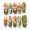 Botanical floral press-on nails in sage, peach and ivory with pink blossoms, gold-tone vines and crystal-like accents