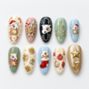 candy canes, wrapped gifts, a decorated tre press on nails