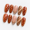 delicate leaf motifs, bronze shimmer and a raised fawn face accent press on nails