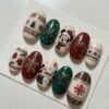 snowflakes, mittens, a Christmas tree, glitter press on nails