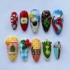 Christmas stockings press-on nails in red, blue and yellow with stockings on a line, a 3D candy cane, a sheep and a duck