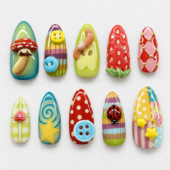press-on nails with 3D mushrooms, buttons, a ladybug, fruit motifs, stars, and patchwork patterns.