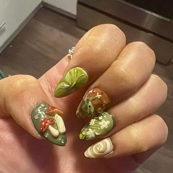 Ka****e wearing Woodland Mushroom Ladybug Press-On Nails